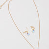 Great Pretenders Boutique Holographic Star Necklace & Clip On Earrings Set